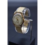 A 9ct gold Smiths De Luxe manual wind wristwatch, 32mm, hallmarked Edinburgh 1952, movement No.