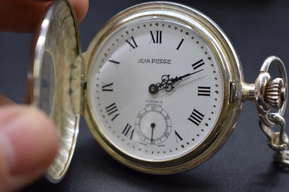 A Jean Pierre 925 half hunter stem wind pocket watch, 50mm, with attached watch chain stamped 925. - Image 2 of 2
