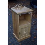 A pine bedside cupboard, 41cm wide x 35cm deep x 87cm high.