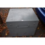 A secure tool box, having double lock, 70cm wide x 64cm deep x 67cm high.