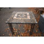 A Kewdos Ltd garden table, having tiled top, 97cm wide x 75cm high.