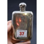 An Edwardian silver hip flask, by W & G Neal, London 1901, 12cm high, 108g.