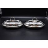 A pair of Victorian silver entrée dishes and covers, by Frederick Elkington, Birmingham 1870,