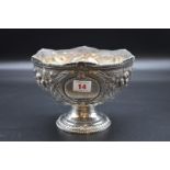 A Victorian embossed silver pedestal bowl, by Atkin Brothers, Sheffield 1894, relief decorated