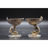 A pair of silver novelty dolphin and shell salts, by Richard Lawton Ltd, London 1988, 5cm high,