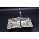 An Edwardian silver rectangular swing handled fruit basket, by E J Partridge, Birmingham 1903,