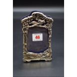 A late Victorian silver photograph frame, decorated game birds, by William Comyns & Sons, London
