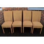A set of four Lloyd Loom chairs.
