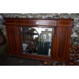 A mahogany inlaid overmantel mirror, 108cm wide.