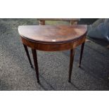 An antique mahogany foldover tea table, 90cm wide x 45cm deep; together with an Edwardian inlaid