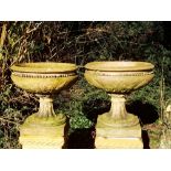Garden pots and urns: A pair of Pulham stoneware urns, late 19th century, stamped Pulham’s