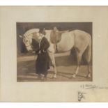 Pictures: Sir Alfred Munnings RA (British 1878 -1959), A signed photographic print of a lady holding