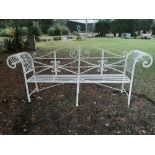 Garden seats: A Regency reeded wrought iron seat, early 19th century, 240cm wide