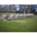 Garden pots and urns: A set of eight Neo-classical style composition stone finials possibly by
