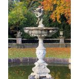 Water features and fountains: A carved white marble fountain, Italian, circa 1900, surmounted by a