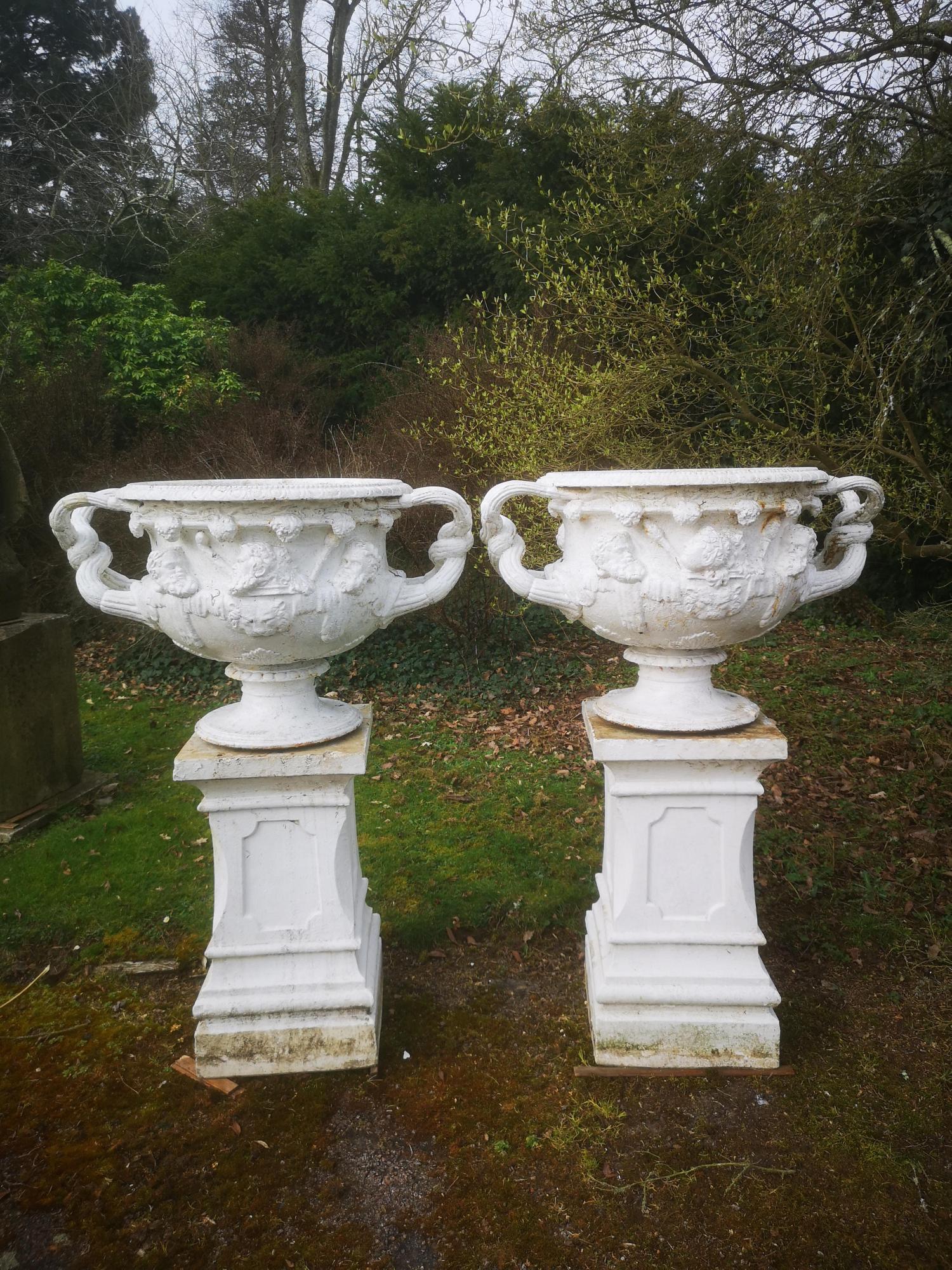 Garden pots and urns: After the Antique: A pair of cast iron Handyside Foundry Warwick vases