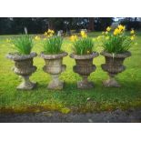Garden pots and urns: A set of four composition stone urns, 2nd half 20th century, 64cm high, Part