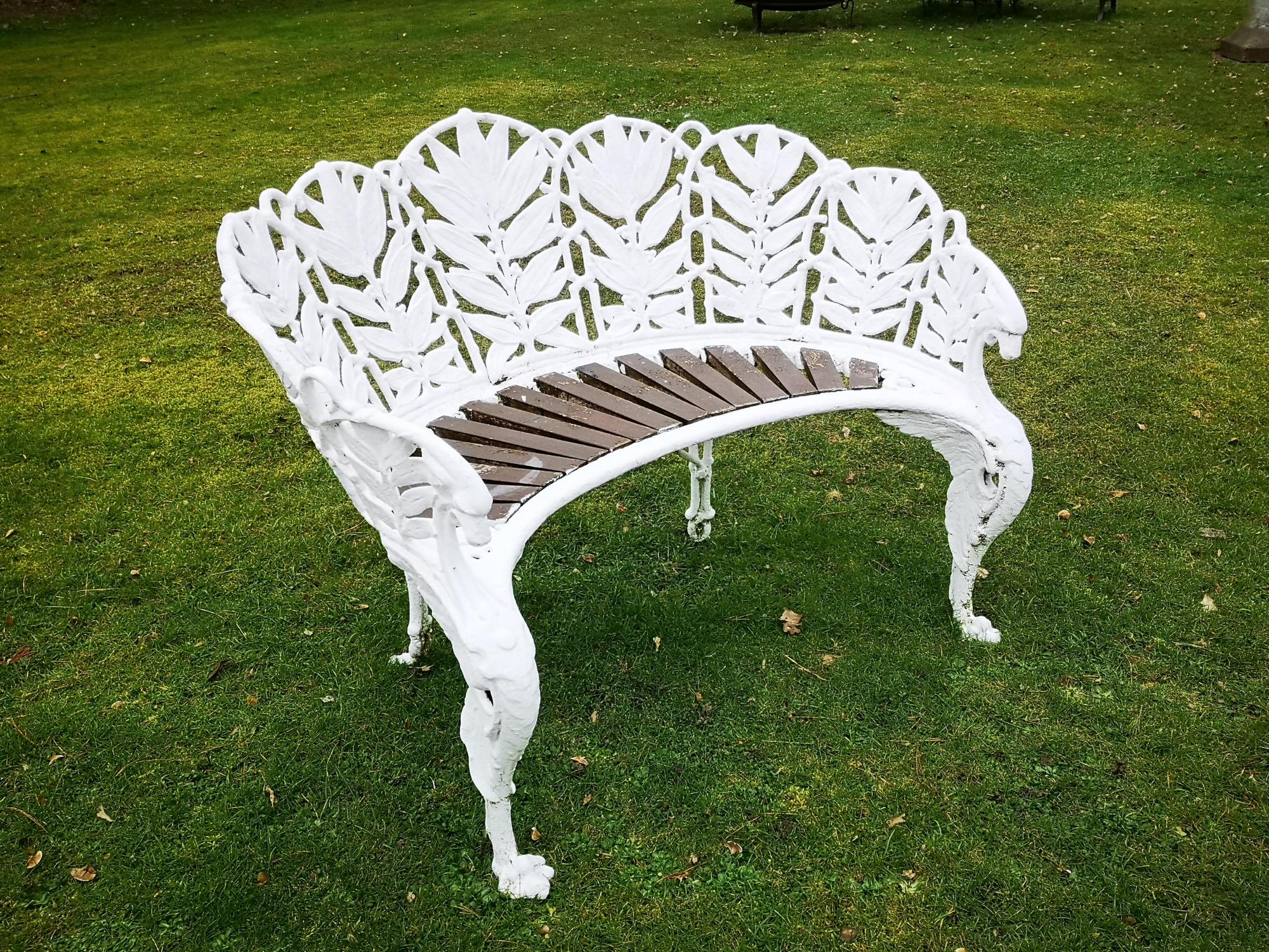 Garden seats: A Coalbrookdale Laurel pattern cast iron seat, circa 1870, foundry marks possibly