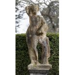 Garden statues: An unfinished part worked carved white marble figure of Apollo, probably after the