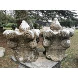 Gate piers and Finials: A pair of carved Kilkenny marble gate pier tops, 18th/19th century, 64cm