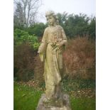 Garden statues: A carved white marble figure of a girl holding flowers, 122cm high , From a