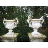 Garden pots and urns: A pair of rare cast iron urns, probably by Fiske, American, 76cm high, From