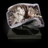 Minerals: An impressive amethyst and calcite specimenBrazilon metal stand34cm wide