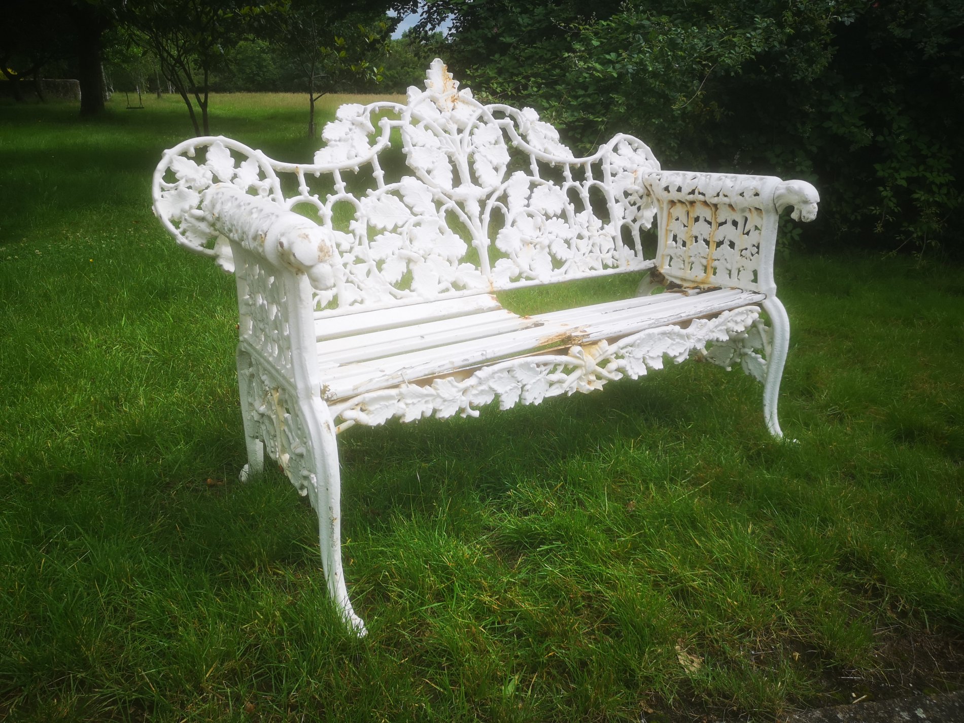 A Coalbrookdale style Oak and Ivy pattern cast iron seat