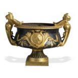 An unusual cast iron, painted and gilded urn