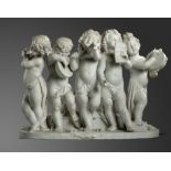 A carved white marble group of child musicians