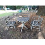 A rare suite of faux bois composition stone furniture