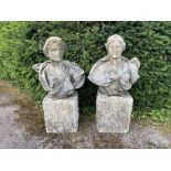 A pair of carved white marble busts of Bacchus and Diana