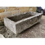 A substantial stone trough