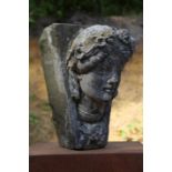 A Victorian carved sandstone keystone of a girls head