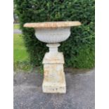 A similar smaller Handyside foundry cast iron urn on pedestal