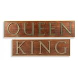 A King sign in bronze letters