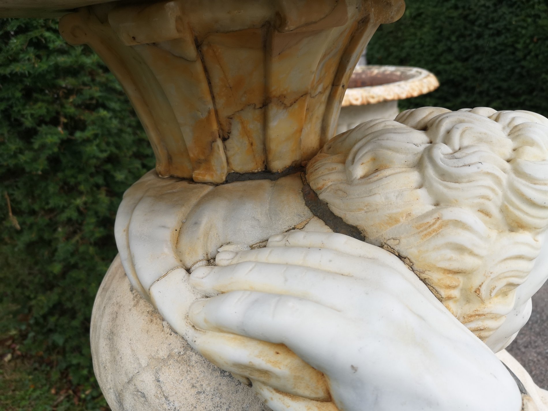 A carved marble and stone figure of a man supporting a bowl - Image 7 of 7