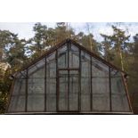 20th Century Iron framed small greenhouse