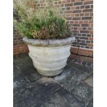 A pair of substantial composition stone tapering cylindrical planters