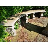 A composition stone curved bench