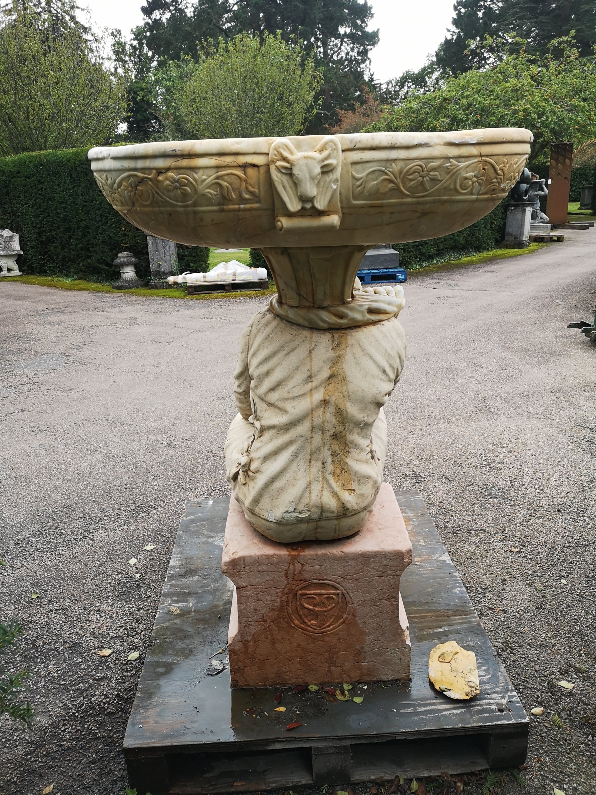 A carved marble and stone figure of a man supporting a bowl - Image 2 of 7