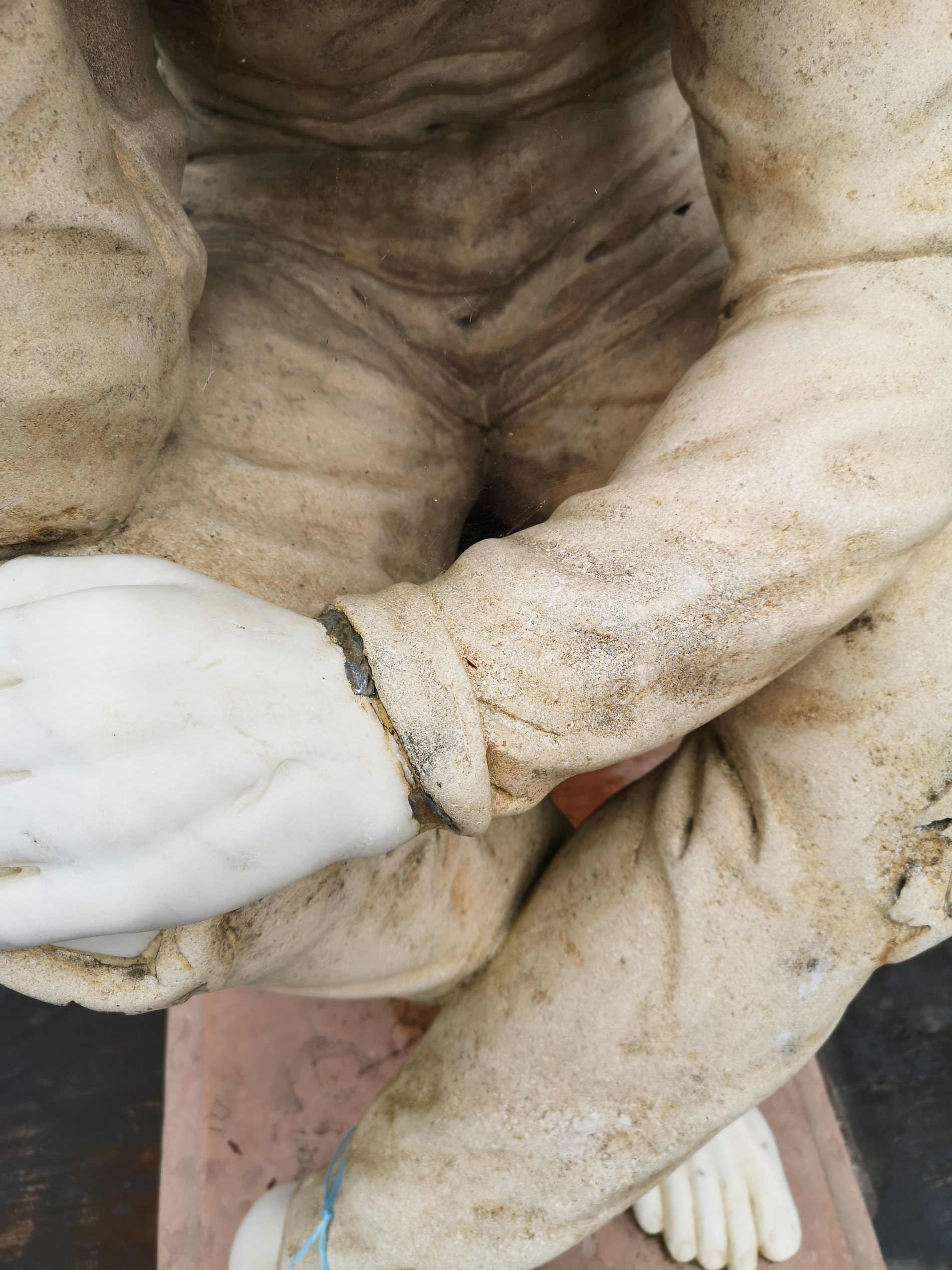 A carved marble and stone figure of a man supporting a bowl - Image 5 of 7