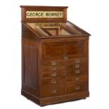 A mahogany artists supply shop cabinet