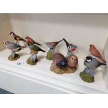 9 misc bird figures