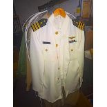 Collection of uniforms RAF , American General, American Navy, Badges, Capos, Helmets, Shoes etc.