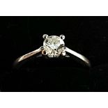 Platinum ring with 0.33solitaire diamond set raised on 4 claws very bright clear stone size L