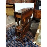 Antique Rosewood and inlaid two tier Sutherland table