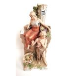 Royal Dux Figure of cherub and girl decorated with flowers and column (slight damage) 50cm