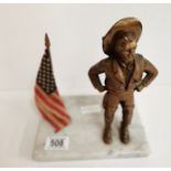 A brass Cowboy Figure Mounted on Marble Base