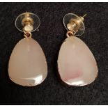 pair of gem stone earings